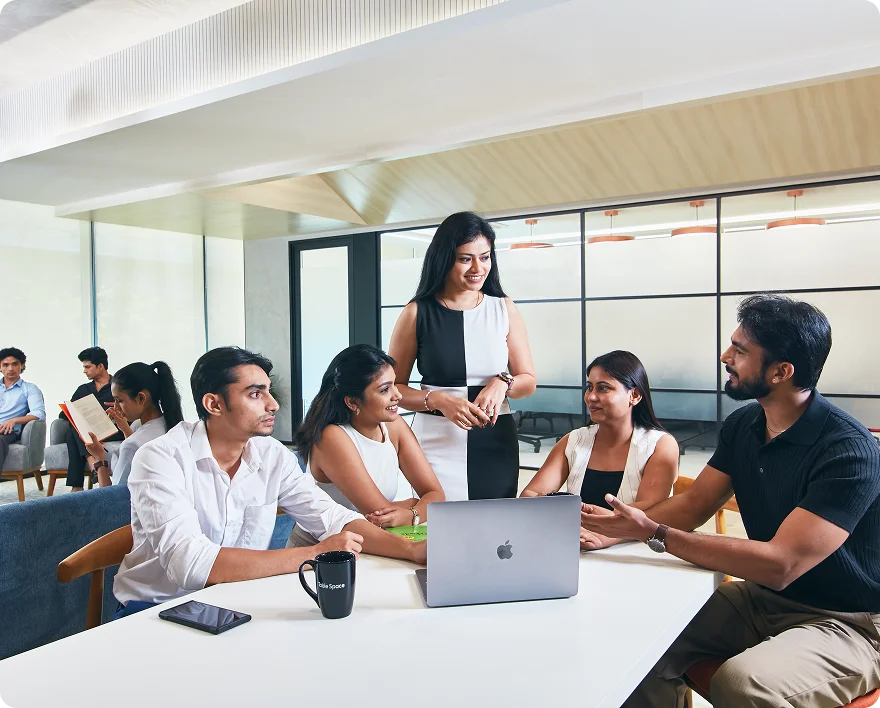 The Table Space team together across the office